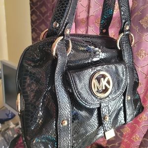 Black and gold Michael purse
